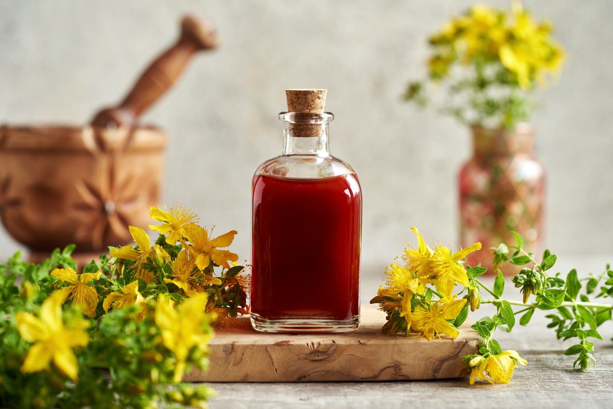 A,Bottle,Of,Healthy,Red,Oil,Made,From,St.,John’s